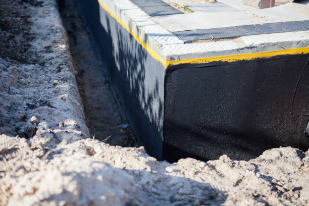 Professional Waterproofing technician working in Barnesville, MD